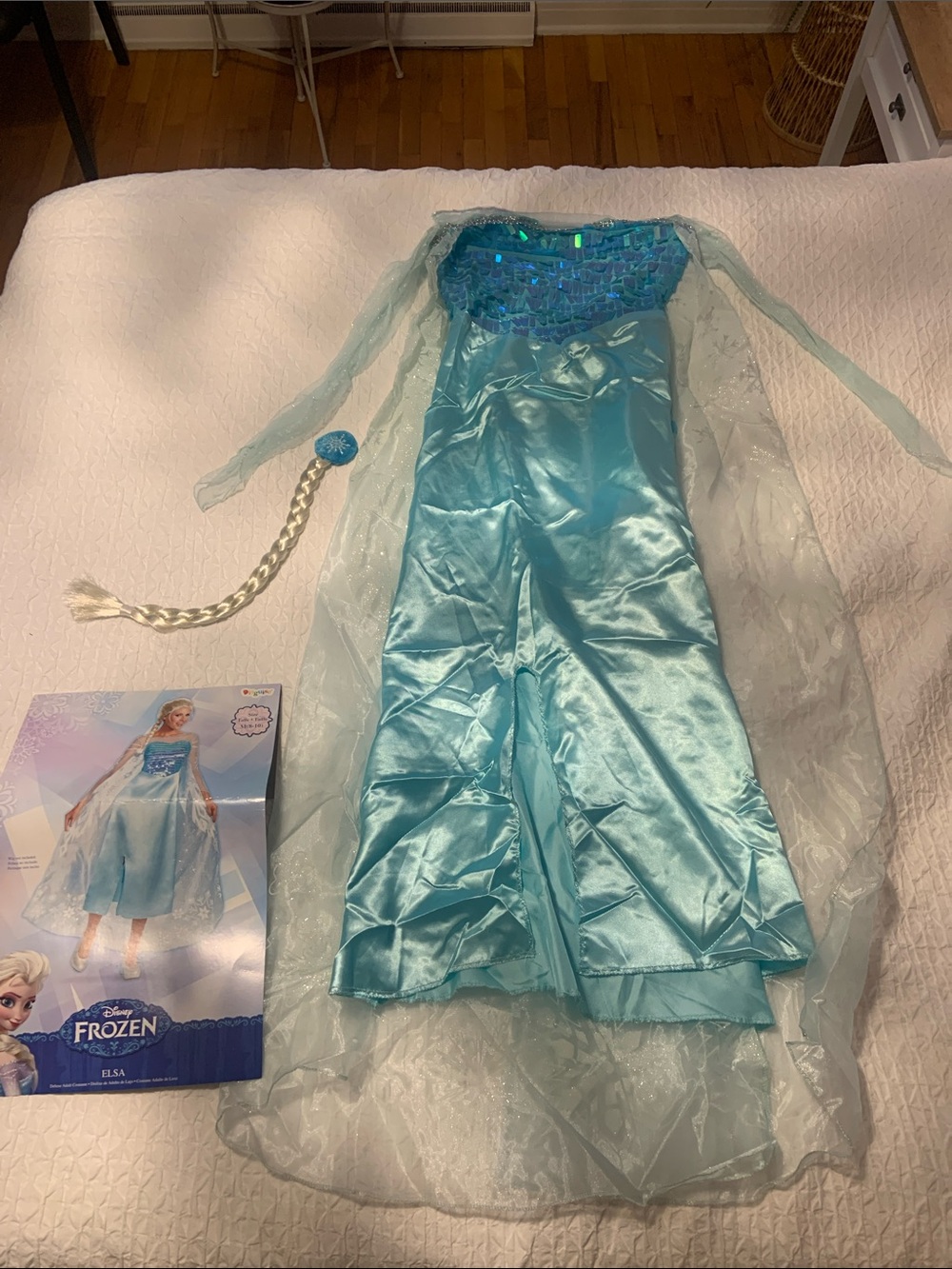 Adult Elsa Frozen Halloween Costume along with braid.